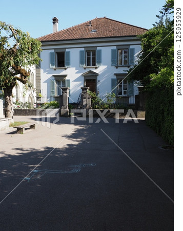 Historical mansion in European Murten town in Switzerland - vertical Historical mansion in European Murten town in Switzerland - vertical 125955929