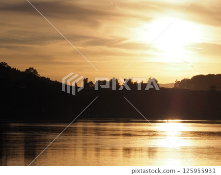 Marvellous sun set over Rhine River near Stein am Rhein town in Switzerland Marvellous sun set over Rhine River near Stein am Rhein town in Switzerland 125955931