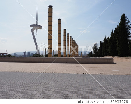 Square with communications tower in Barcelona city at Catalonia district in Spain Square with communications tower in Barcelona city at Catalonia district in Spain 125955978