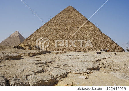 Scenic pyramids of Cheops and Chephren in African Giza city near Cairo in Egypt 125956019