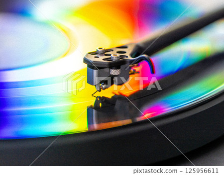 vinyl record with colorful lights reflection vinyl record with colorful lights reflection 125956611