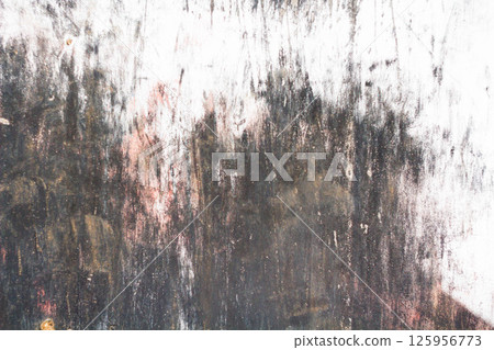 Old cracked paint. Grunge wall. The texture of the wall with deep cracks. Old cracked paint. Grunge wall. The texture of the wall with deep cracks. 125956773