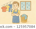 A man having trouble doing laundry in the rain 125957084