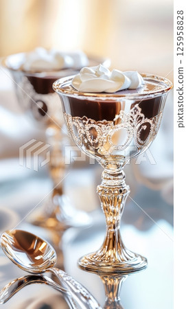 Luxurious chocolate parfait served in vintage glass, showcasing rich layers, glossy chocolate, and elegant details 125958828