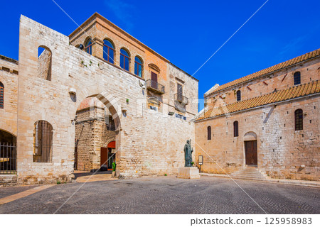 Bari, Italy. Portico dei Pellegrini in San Nicola Square, historic downtown around the famous basilica 125958983