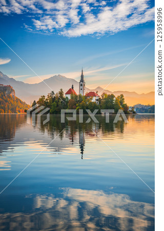 Bled, Slovenia. Beautiful sunrise sky colors over Lake Bled 125958996