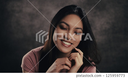 Smiling Woman with Eyes Closed in Relaxation 125959773