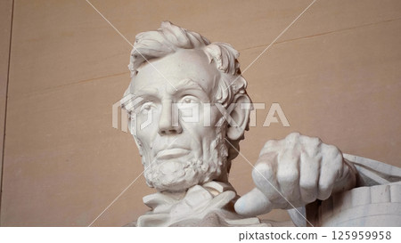 Abraham Lincoln statue resting hand on chair in Washington DC Abraham Lincoln statue resting hand on chair in Washington DC 125959958