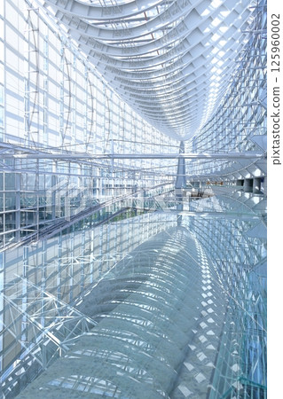 The roof of a building reflected in the glass 125960002