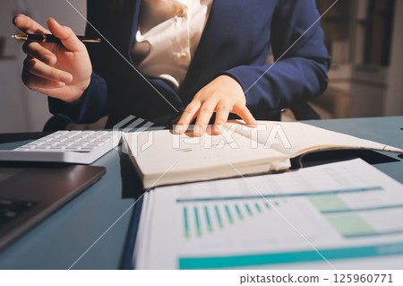 Expert woman asian female people review data number costing managerial account prepare monthly actual cost variance report at tax audit office. ESG sheet budget control ERP process service project. Expert woman asian female people review data number costing managerial account prepare monthly actual cost variance report at tax audit office. ESG sheet budget control ERP process service project. 125960771
