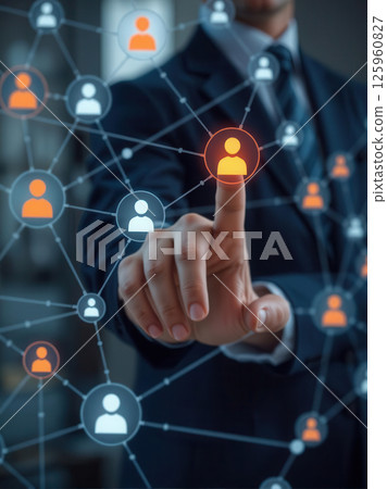 Businessman interacting with virtual human resource network and digital employee icons Businessman interacting with virtual human resource network and digital employee icons 125960827