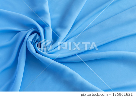 Vivid twisted plain light blue fabric cloth texture close up Vivid twisted plain light blue fabric cloth texture close up 125961621