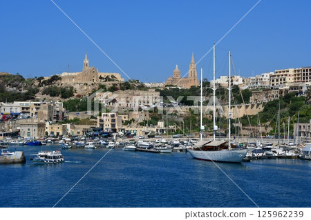 Republic of Malta, Gozo, Mgarr, Mgarr harbour, sailing ship, Lourdes Chapel, Gasnierem Parish Church 125962239
