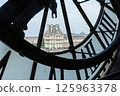 View of the Louvre, visible through the huge clock of the Museum de Orsay 125963378