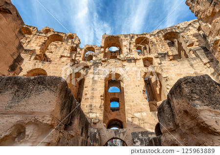 View to the rows of archs of the ancient african Roman Colosseum amphitheatre, El Jem, Mahdia, Tunisia 125963889