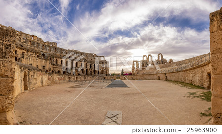 Entrance to ancient african Roman Colosseum amphitheatre arena panorama with ruins and columns, El Jem, Mahdia, Tunis 125963900