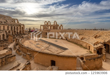 Ancient african Roman Colosseum amphitheatre arena, ruins and columns, El Jem, Mahdia, Tunis 125963906