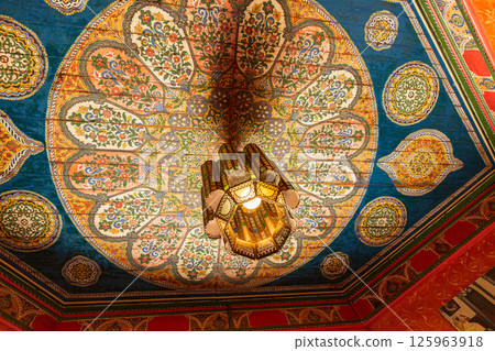 painted ceiling with floral pattern in the Restaurant in Mosque of Paris 125963918