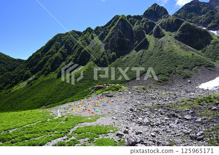 The colorful tent site in the Northern Alps and Karasawa Cirque The colorful tent site in the Northern Alps and Karasawa Cirque 125965171