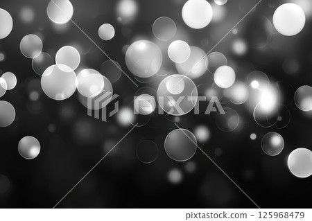 Abstract light bubbles desaturated soft orbs floating with calm, white circle effect on dark background 125968479