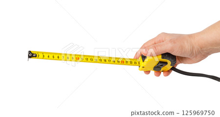 Hand holding measuring tape on white background Hand holding measuring tape on white background 125969750