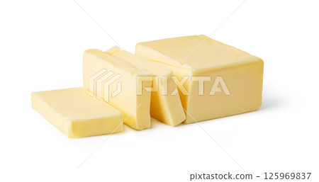 Butter block and slices resting on white background 125969837