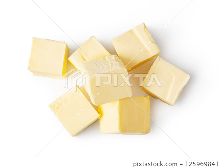 Butter block and slices resting on white background 125969841