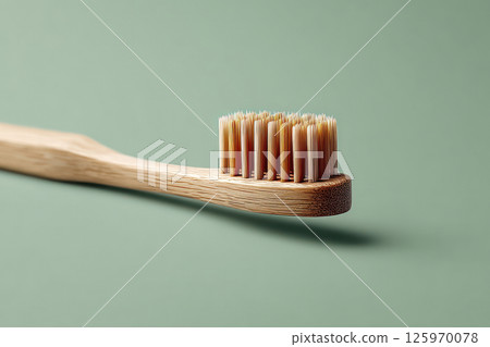 Minimalist photography of eco friendly bamboo toothbrush and natural toothpaste products Minimalist photography of eco friendly bamboo toothbrush and natural toothpaste products 125970078