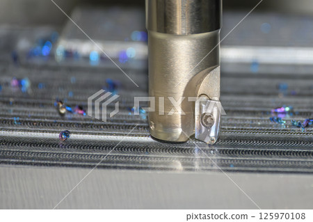 Close up scene the CNC milling machine rough cutting the mold parts by indexable tools. 125970108