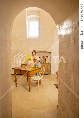 Morning Stillness in a Stone Kitchen 125970221