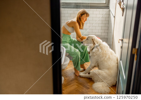 Brushing My Big Fluffy Dog 125970250