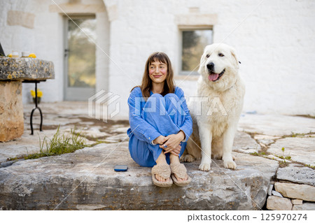Peaceful moment with a loyal dog 125970274