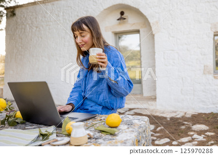 Morning work with coffee in nature 125970288