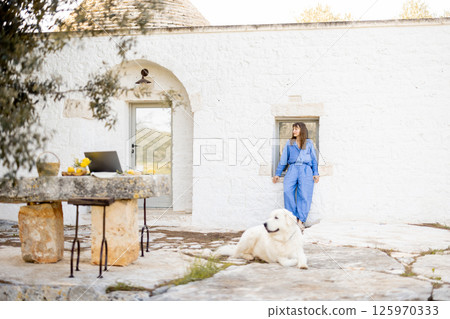 Morning calm outside the trullo 125970333