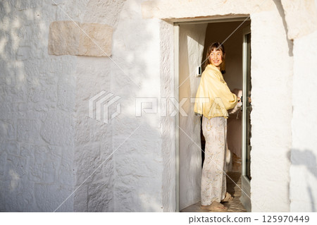 Opening the Door to a Peaceful Morning 125970449