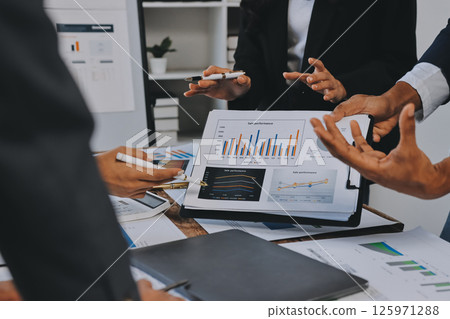 Accounting company provide finance and taxation planning for profitable cash flow, Auditor and accountant team working in office, analyze financial data and accounting record with calculator.Insight Accounting company provide finance and taxation planning for profitable cash flow, Auditor and accountant team working in office, analyze financial data and accounting record with calculator.Insight 125971288