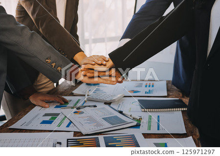 Business handshake for teamwork of business merger and acquisition,successful negotiate,hand shake,two businessman shake hand with partner to celebration partnership and business deal concept Business handshake for teamwork of business merger and acquisition,successful negotiate,hand shake,two businessman shake hand with partner to celebration partnership and business deal concept 125971297