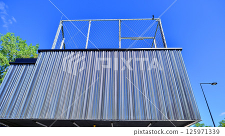 Architecture details of modern metal sheet facade storage building minimal style. Architecture details of modern metal sheet facade storage building minimal style. 125971339