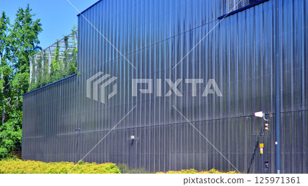 Architecture details of modern metal sheet facade storage building minimal style. 125971361