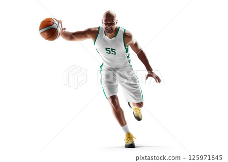 Basketball. Male basketball athlete dribbling the ball. One professional basketball player in motion and action. Sport emotion. Isolated 125971845