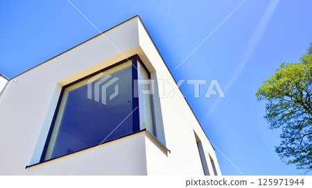 New single family houses in a new development area. Residential homes with modern facade.  125971944