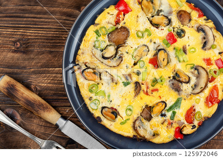 A hearty breakfast of omelet. A hearty breakfast of omelet. 125972046