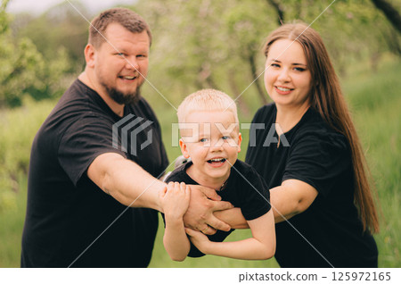 Family Portrait in Outdoor Setting with Smiling Faces 125972165