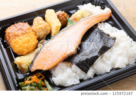 Delicious salted salmon and seaweed bento Delicious salted salmon and seaweed bento 125972187