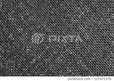 Upholstery black jacquard fabric diagonal weave texture, textile background, cloth structure Upholstery black jacquard fabric diagonal weave texture, textile background, cloth structure 125972370