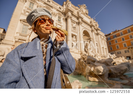 Smiling with a Cannolo by Trevi Fountain 125972558