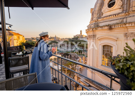 Golden rooftop moment in Rome 125972560