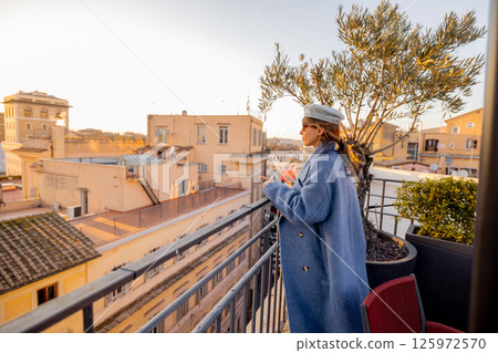 Golden rooftop moment in Rome 125972570