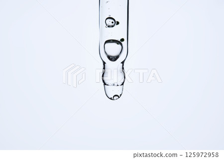 Soothing serum with natural green tea extract in a pipette. 125972958