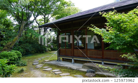 A tea room surrounded by fresh greenery A tea room surrounded by fresh greenery 125973962